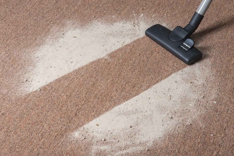 Is It Better to Dust Or Vacuum First?